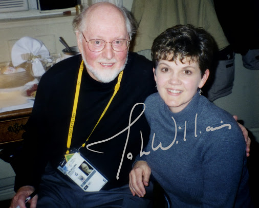  Jeannine junto al compositor John Williams.